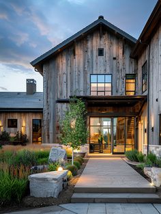 Rustic Home Exterior Ideas: Barn-Style House with Modern Fixtures Rustic Industrial House Design Exterior, Wooden Home Exterior, Wood Farmhouse Exterior, Rustic Modern Cabin Exterior, Rustic Board And Batten Exterior, Rustic Modern House Exterior, Rustic Architecture, Modern Rustic Exterior, Reclaimed Wood Exterior