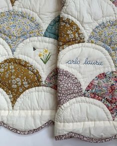 two quilts that have been made to look like flowers