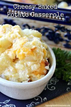 cheesey baked potato casserole in a white bowl