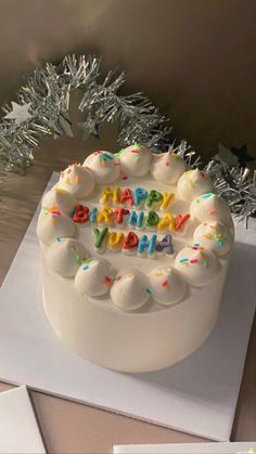 a birthday cake sitting on top of a table