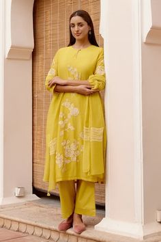 Citrine yellow kurta with floral applique embroidery. Paired with a pant and dupatta with embroidered linear accents. - Aza Fashions Fitted Yellow Kurta With Dabka Detail, Yellow Embroidered Straight Kurta Set, Fitted Yellow Kurta With Embroidered Border, Semi-stitched Yellow Kurta With Cutdana, Yellow Embroidered Fitted Kurta, Kurta With Pants, Floral Applique, Muslin Cotton, Pants Pattern