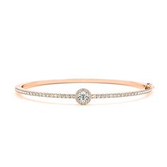 BRACELET INFORMATION Metal Type: (select above) Available in 14K and 18k white, yellow, rose gold and platinum 950.Metal Weight: Approx. 12.0 grams ( for 14K - 7 inches )Width (Center) : Approx. 8.0 mmWidth : Approx. 1.8 mm DIAMOND INFORMATION Diamond Cut: Round Brilliant CutNumber of Stones (7 inches): 56Carat Total Weight: 1.80 ctw.Stone Breakdown: 40 x 0.025 ct, 15 x 0.01 ct. , 1 x 0.65 ct.Diamond Color: F-G Diamond Clarity: VS1- SI1Enhancement: None (100% Natural) Solitaire Bands, Diamond Bangle Bracelet, Diamond Bangles Bracelet, Engagement Ring Diamond Cut, Three Stone Engagement, Cushion Cut Diamonds, Diamond Bangle, Stone Engagement Rings, Shop Engagement Rings