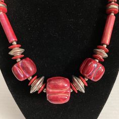 Interesting and artsy, this item is in very good vintage condition.  Metal fittings could use a polish.  Please examine pictures carefully before purchasing.  All items are sold as is. Artisan Red Beaded Necklace, Artisan Red Beaded Necklace With Round Beads, Retro Large Beads For Gifts, Artisan Red Spacer Beads, Vintage Style Wooden Beads For Jewelry Making, Unique Red Beaded Necklace With Round Beads, Artisan Red Collectible Jewelry, Vintage Red Wooden Beads, Artisan Red Jewelry For Collectors