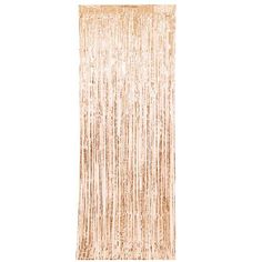 a gold fringe curtain hanging on a wall