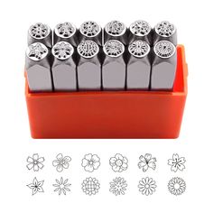 a rubber stamp set with flowers and wheels on the front, in an orange holder