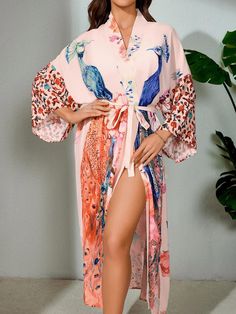 **Ready to Turn Heads?** You're not just buying a robe--you're making a statement. Our Peacock Kimono Robe is your new go-to for effortless style, whether you're at the beach, lounging at home, or stepping out for a casual day. This isn't just about looking good--it's about feeling unstoppable. **Here's Why You Need It - **Stand Out Instantly Featuring a bold peacock design that screams "unique," this robe is for the woman who isn't afraid to be the center of attention. The vibrant colors and de Wrap Dresses Summer, Robe For Women, Round Wardrobe, Kimono Boho, Elegant Bohemian, Belted Wrap Dress, Womens Wrap Dress, Maxi Kimono, Summer Kimono