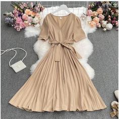 Solid V-neck Dress With Tie Waist, Elegant Beige V-neck Short Sleeve Dress, Elegant Brown V-neck Dress For Spring, Summer Pleated V-neck Dress With Short Sleeves, Brown V-neck Solid Color Dress, Brown V-neck Dress, Elegant V-neck Short Sleeve Dress, Brown V-neck Solid Dress, Fitted Pleated Belted Summer Dress