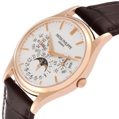 Patek Philippe Complications Perpetual Calendar Rose Gold Mens Watch 5140R. Automatic movement. Rhodium plated, fausses cotes decoration, straight-line lever escapement, Gyromax balance adjusted to heat, cold, isochronism and 5 positions, shock absorber, free-sprung self-compensating flat balance spring, 22K gold micro-rotor. 18K rose gold case 37.2 mm in diameter. Transparent exhibition sapphire crystal caseback. . Scratch resistant sapphire crystal. Silver dial with raised rose gold baton hour Rose Gold Analog Chronograph Watch For Formal Occasions, Rose Gold Chronograph Watch Accessories With Rectangular Dial, Modern Rose Gold Chronograph Watch For Formal Occasions, Rose Gold Chronograph Watch With Subdials For Business, Elegant Chronograph Watch For Anniversary, Elegant Analog Chronograph Watch For Anniversary, Brown Anniversary Watches With Diamond Hour Markers, Business Rose Gold Watches With Metal Dial, Luxury Analog Jewelry And Watches For Business