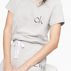 Calvin Klein Carousel Logo Sleep T-Shirt + Sleep Joggers Set New ; Size M Color: Grey Heather Classic And Essential, This Calvin Klein Underwear Pajama Sleep Set Is Crafted With Extra Soft Cotton Stretch For Flexible Comfort. Comes With A Short Sleeve Tee With A Crewneck, Drawstring Jogger Sweatpants With Slip Pockets And Finished With Iconic Ck Logo Detailing. Product Details Iconic Ck Logo Styling Extra Soft Cotton Stretch For Flexible, Breathable Comfort Comes With Tee + Jogger Sweatpants For Calvin Klein Pajamas, Ck Logo, Plaid Pajama Pants, Flannel Pajama Pants, Joggers Set, Womens Pajamas Pants, Vintage Calvin Klein, Drawstring Jogger, Fleece Pajamas