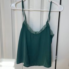 Nwot, Never Worn American Eagle Green Tank Top 100% Polyester, Size Medium With Lining Lace Trim Front And Scrunched Back For Added Stretch/Comfort Rich Emerald Green With No Flaws Adjustable Straps Green Casual Camisole With Lace Trim, Casual Green Camisole With Lace Trim, Emerald Green Lace, Lace Trim Tank Top, Green Tank Top, Green Tank, Green Lace, Top 100, Emerald Green