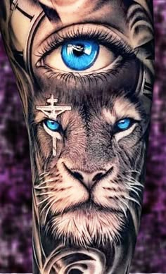 a cat with blue eyes and cross on it's face is shown in this tattoo