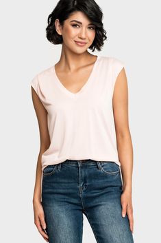 This soft and drapey knit top can easily be dressed up or down and is sure to become your favorite V-Neck of the season. 74% Modal | 26% Polyester Delicate Wash Cycle, Dry Flat. Length 24" (size small) Sabrina is 5'7 and wearing XXS in Blush Light Red Color, Fern Green, The Favorite, Coral Pink, Military Green, V Neck Tee, Black Tee, Knit Top, Lavender