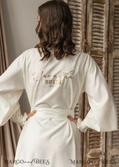 Luxury Feminine Satin Robe, Luxury Long Sleeve Satin Robe, Luxury Daywear Robe With Lace Trim, Luxury Feminine Wedding Robe, Luxury Chic Wedding Robe, Luxury Satin Party Robe, Luxury Summer Wedding Night Robe, Luxury Satin Robe With Lace Trim, Luxury Elegant Robe For Formal Occasions