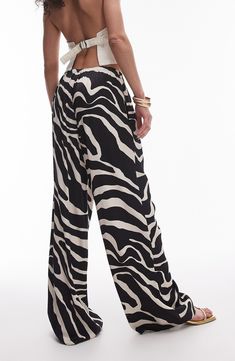 Turn heads in these flowy satin pants flaunting a bold zebra pattern and full-length wide legs. Elastic waist Side-seam pockets 100% viscose Machine wash, line dry Imported Satin Wide Leg Pants, Pants Satin, Zebra Pattern, Satin Pants, Flowy Pants, Fabric Gift Bags, Wide Legs, Nordstrom Store, Fabric Gifts