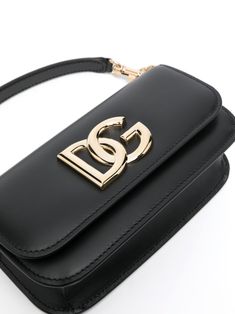 Meet your new go-to accessory. This stunning black leather bag is as versatile as it is chic, perfect for any occasion. It's the little details that make all the difference. Crafted from luxurious black calfskin leather Features a front flap with a double magnet closure Adorned with an elegant DG logo Includes a removable handle and a sliding chain shoulder strap Equipped with an internal flat pocket for easy organization Accented with gold metal hardware | Dolce & Gabbana Women's 3.5 Leather Sh Texture Logo, Dg Logo, Debossed Logo, Chic Bags, Genuine Leather Handbag, Black Leather Handbags, Leather Cap, Black Cross Body Bag, Dolce & Gabbana