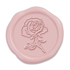 a pink wax stamp with a rose on it