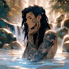 a man with long black hair and tattoos sitting in the water next to a waterfall