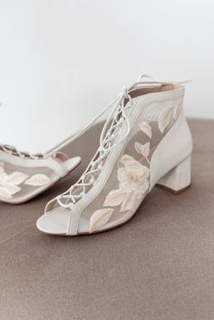 Romantic lace wedding boots with a peep toe and lace-up down the front. They are decorated with lace embroidery with roses and roe leaves. Thanks to the adjustable lacing, this pair will fit any foot width. Comfortable wedding bridal shoes for a day of dancing and fun, the elegant block heel is only 5.5 cm / 2.2 inches. Inside there is a soft memory foam insole, which gives a feeling of additional comfort when walking. Tunit outsole is made of a mixture of leather chips and rubber, it's more wea Floral Wedding Shoes, Lace Wedding Boots, Boots With Laces, 2024 Fits, Secret Wedding, Bridal Boots, Pointy Heels, Wedding Boots, Wedding Shoes Bride