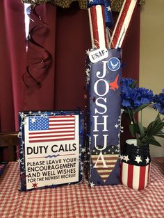 an american flag and some patriotic decorations on a table