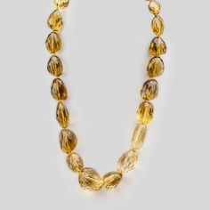 This Citrine Gemstone Necklace is made with top quality, natural pear-shaped Citrine measures 18 inch. It is versatile and easy to style, making it the ideal fine jewelry gift for any occasion. Invest in this elegant, eye-catching piece for a touch of sophistication. Elegant Beaded Necklaces With Teardrop Natural Stones, Elegant Drop Necklace With Gemstone Beads, Elegant Teardrop Beaded Necklaces With Natural Stones, Elegant Teardrop Beaded Necklace With Natural Stones, Luxury Faceted Beaded Necklace For Formal Occasions, Luxury Briolette Drop Necklace, Luxury Formal Faceted Beaded Necklaces, Luxury Formal Faceted Beaded Necklace, Briolette Natural Stones Necklace For Formal Occasions