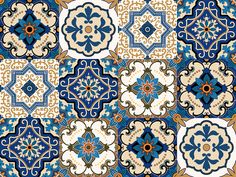 an ornate blue and white tile pattern with many different designs on the tiles, all in different colors