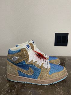 Custom Blue and Gold Iced Out Blingged Nike Air Sneakers with white Shoe Strings, Size Euro 46, Fits Men's 11.5, Measures 28cm Long No Box. (Shoes will not be shipped with Shoe box) I will put in a packing/shipping box and properly secure and wrap them up for protection.) If shipped in shoe box all labels will be removed, due to customizations. Note: some shoes may have small imperfections that's beyond my control please look at the last photo of right shoe the paint is a little messy around outer sole. If this is no issue please continue with your order and enjoy! Sneakers are fully blinged with different Blue, and Gold stones, the featured shoe is a Size Euro 46, Fits Men's 11.5, Measures 28cm Long, these shoes are complete and ready to ship today from Florida, I ship using regular groun Nike Air Sneakers, Air Sneakers, White Shoe, Box Shoes, Blue And Gold, Custom Shoes, White Shoes, Shoe Box, Bugatti