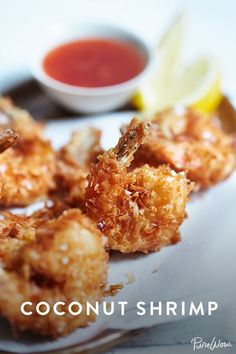 some fried food on a plate with dipping sauce