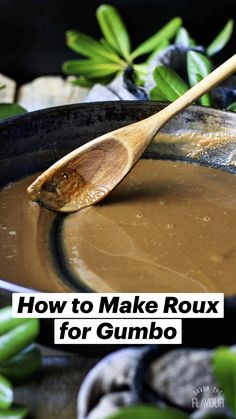 a wooden spoon stirring chocolate in a skillet with green leaves and rocks on the side