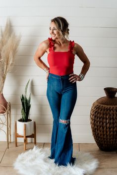 Our Influenced bodysuit tank is a must have layering piece for this season! It goes perfect with any of our flowy, cardigans this Spring or Summer. Or just wear it by itself with high waisted jeans and a statement piece of jewelry. Model is Wearing a Small Tank Bodysuit, Red Top, Layering Pieces, Bell Bottoms, Bell Bottom Jeans, High Waist Jeans, High Waisted, Wardrobe, Red