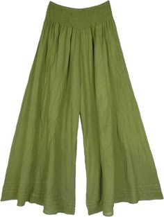 A cool pair of palazzo pants in olive green that you can wear in every season; these pants are extremely comfortable and are made of lightweight cotton fabric.  The bottom of the pants is very wide, which gives it a flowy and feminine look as you walk. #tlb #SplitSkirtsPants #Crinkle #vacationclothing #beachwrap #bohemianfashion #WideLegPants #GreenPants #HippiePants Olive Wide Leg Relaxed Fit Pants, Cotton Wide Leg Full-length Pants In Solid Color, Cotton Wide Leg Pants In Solid Color, Wide Leg Cotton Pants In Solid Color, Solid Color Cotton Wide Leg Pants, Olive Wide Leg Pants For Spring, Olive Wide Leg Pants With Elastic Waistband, Olive Wide-leg Spring Pants, Olive Wide-leg Pants For Spring