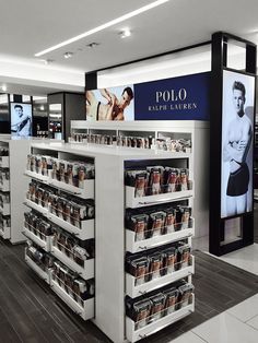 the inside of a store with shelves full of men's products