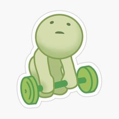 a green sticker with an image of a cartoon character sitting on top of two wheels