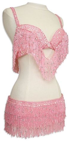 a mannequin with pink sequins on it's chest and back