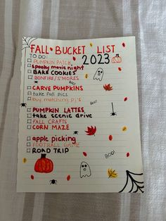 a list for fall bucket lists on a sheet of paper