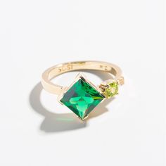 This cluster of standard-cut stones was re-imagined to evoke a message of the enduring beauty of the natural world. What one might perceive as mundane, the wearer can wield into hope and inspiration with their nurturing clarity. MATERIALS- Set in 14k solid gold- Featuring a cultivated Emerald & natural Peridot and Anniversary Jewelry With Si Clarity And Emerald Cut, Si Clarity Emerald Cut Jewelry For Anniversary, Fine Jewelry Tsavorite Birthstone Ring, Green Cluster Rings In 14k Gold, 14k Gold Cluster Jewelry With Birthstone, Emerald Cut Multi-stone Jewelry For Promise Ring, Emerald Cut Multi-stone Promise Ring, Green Crystal Promise Ring In Fine Jewelry Style, Green Crystal Promise Ring Fine Jewelry