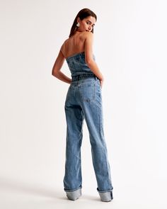 Elevate your wardrobe with the Abercrombie & Fitch Women's Strapless Denim Jumpsuit, a perfect blend of style and comfort. This piece is designed to flatter, crafted from a soft mix of cotton and elastane that ensures both flexibility and fit.

- **Size**: XXS Petite
- **Color**: Medium Wash
- **Material**: Body: Cotton, Elastane
- **Gender**: Female
- **Age Group**: Adult

Featuring a relaxed pant silhouette with a cuffed hem and contemporary seaming details, this jumpsuit offers a chic, strapl Casual Strapless Denim Jumpsuit, Casual Medium Wash Strapless Denim Jumpsuit, Strapless Denim Jumpsuit With Pockets For Summer, Casual Strapless Denim Jumpsuit With Pockets, Casual High Rise Strapless Denim Jumpsuit, Casual Strapless Denim Jumpsuit For Spring, Casual Medium Wash Strapless Jumpsuit, Strapless Medium Wash Denim Jumpsuit For Spring, Casual High Rise Strapless Jumpsuit For Spring