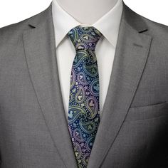 Designed with a playful and beautiful spin to a classic pattern, this navy tie features a woven, iridescent paisley pattern with Mickey's silhouette at the center that pops with color. Add a touch of whimsy to your wardrobe with this tie. Experience enchantment with our expertly crafted 100% Silk tie. It's built to last, infused with Disney magic, and ready to accompany you on whimsical adventures. Officially licensed by Disney. Multicolor Paisley Print Suit And Tie Accessories For Business, Elegant Multicolor Paisley Print Suit And Tie Accessories, Elegant Multicolor Paisley Print Ties, Formal Multicolor Paisley Suit And Tie Accessories, Elegant Patterned Ties With Paisley Print, Elegant Multicolor Ties For Spring, Mickey Silhouette, Navy Tie, Holiday Looks