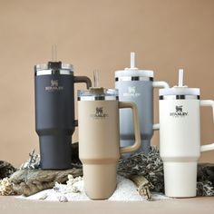 several different types of coffee mugs sitting next to each other