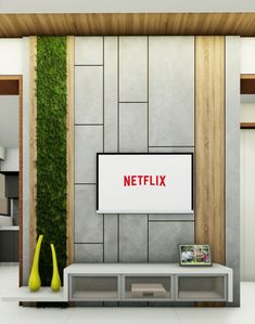 a television sitting on top of a wooden shelf