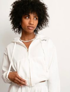 Experience the perfect blend of comfort and style. With a boxy cut and an almost-cropped length, this zip up  provides a flattering fit that's both cozy & chic.  Featuring a gold zipper that adds an extra layer of luxury to elevate your pre-wedding moments.   Product Details:  Ribbed Waistband And Cuffs  Gold Zipper  Front Side Pockets  Embroidered Logo Plastic Water Bottles, Wear With Leggings, Clothing Gifts, Drawstring Jogger, Bridesmaid Outfit, Cotton Fleece, Contemporary Fashion, Staple Pieces, Clothes Gift