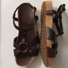 These Beautiful Sandals Are Preowned,Tried On Several Times,Never Worn Outside Comfortable Leather/Cork Footbed Non Slippery Robber Outsole Sz 7.5 C1 Brown Casual Ankle Strap Sandals, Casual Leather Timberland Sandals, Timberland Leather Sandals With Cushioned Footbed, Casual Timberland Sandals For The Beach, Casual Timberland Beach Sandals, Timberland Leather Sandals With Removable Insole, Brown Sandals With Cork-bed Midsoles And Round Toe, Timberland Sandals For Summer Beach, Timberland Leather Open Toe Sandals