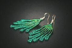 Emerald Boho Earrings Fringe Beaded Earrings Dangle Seed Elegant Green Beaded Fringe Earrings, Elegant Handmade Green Beaded Earrings, Elegant Green Beaded Drop Earrings, Elegant Green Jewelry With Tassels, Elegant Green Tassel Jewelry, Green Beaded Earrings With Beaded Fringe, Green Beaded Fringe Earrings With Round Beads, Green Beaded Earrings With Round Beads And Fringe, Green Beaded Earrings With Fringe