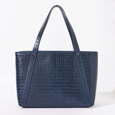 Fabricated in our croc embossed leather, this tote is as beautiful as it functional. With a complete zipper closure and an interior zip pocket you'll be able to keep all your daily contents safe, laptop included! We also love how structured it is- it will stand up on it's own even when it isn't full (and don't worry about scratching the bottom- it has feet). Bag Stand, Zip Tote, Embossed Leather, Emboss, Stand Up, Chloe, Zip Pockets, Laptop, Tote Bag