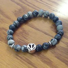 Grey N Black Lava Stone Bead With Anchor Charm Stretch Bracelet Anchor Charm, Lava Stone, Bead Bracelet, Stretch Bracelet, Stretch Bracelets, Womens Jewelry Bracelets, Stone Beads, Mens Bracelet, Beaded Bracelets