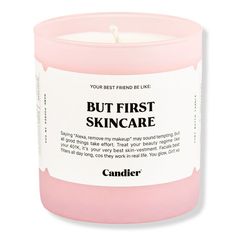 a pink candle that says, but first skin care