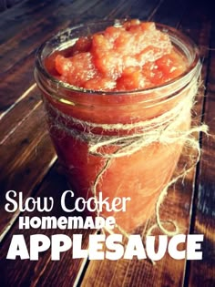 a jar filled with food sitting on top of a wooden table