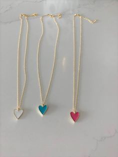 Enamel Heart Charm Necklace, Lovely Heart Pendant Necklace, 18K Gold over Genuine Sterling Silver, Excellent Quality, Pink Heart, Blue Heart-----------------------------------------------------------------------------------------Beautiful enamel heart charm necklace great for everyday wear. It compliments any outfit and comes at a great affordable price. A wonderful gift for yourself or for any loved one and friend - purchase one today!♦ Materials: Sterling Silver, 18K Gold, Enamel♦ Available co Dainty Multicolor Jewelry For Valentine's Day, Blue Open Heart Necklace For Valentine's Day, Cute Double Heart Jewelry With Heart Print, Heart-shaped Pink Jewelry For Mom, Cute Blue Jewelry With Heart Charm, Blue Heart Necklace For Valentine's Day, Cute White Heart Necklace For Valentine's Day, Cute Blue Jewelry For Valentine's Day, Dainty Blue Necklace For Valentine's Day