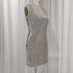 Make a grand entrance in this stunning handmade Crystal Mesh Dress, designed to captivate and shine at every angle. Perfect for a night out, special occasion, or red carpet event, this rhinestone mini dress is the ultimate statement piece. Crafted from premium crystal mesh fabric, it sparkles beautifully under the light, giving you an unforgettable look. The dress features an alluring open-back design that adds a hint of daring elegance, while the lace-up sides offer an adjustable fit that accen Crystal Mesh Dress, Rhinestone Mini Dress, Camille Dress, Rhinestone Fabric, Sparkle Party, Mesh Fashion, Dress Luxury, Crystal Fashion, Dramatic Look