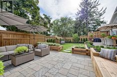 an outdoor patio with seating and umbrellas