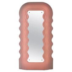 an unusual shaped mirror is shown against a white background